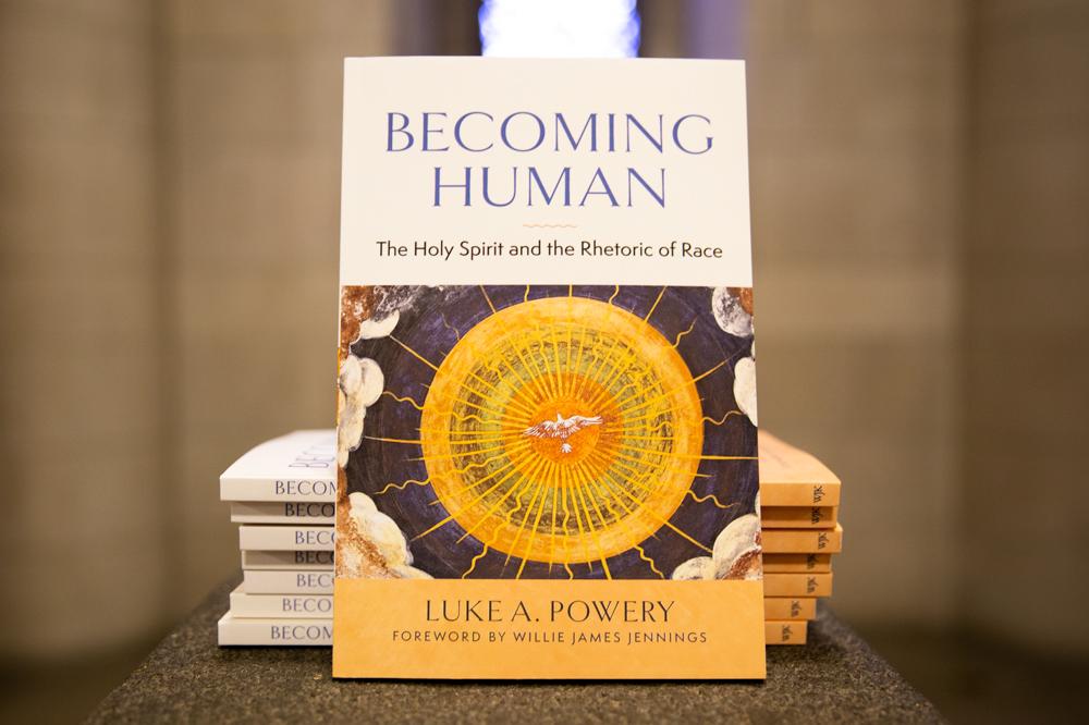 Photo featuring book cover of Becoming Human